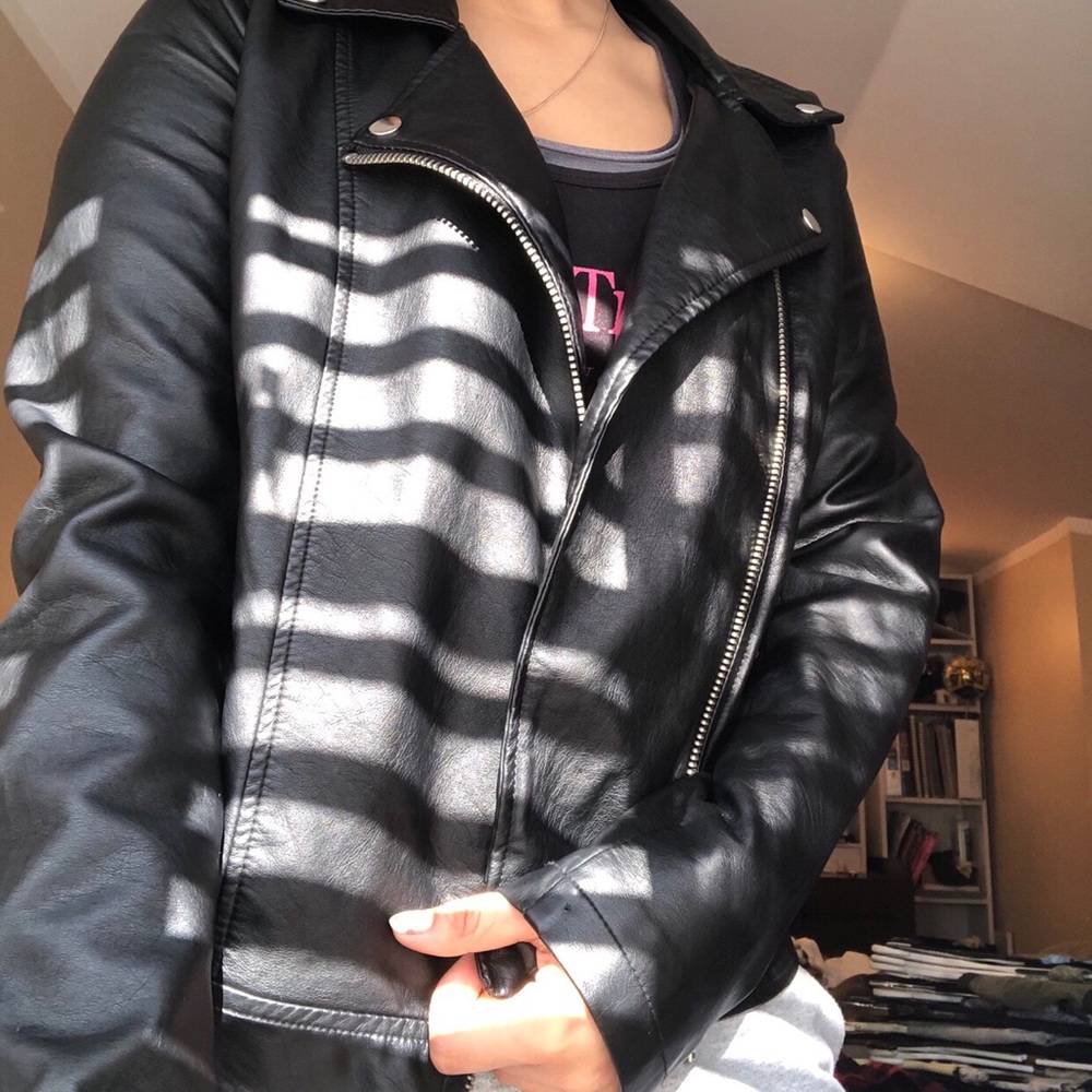 Badass leather jacket with cool silver hardware.